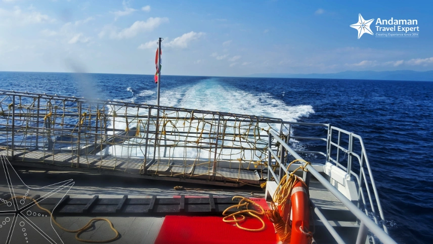 An Andaman island appearing on the horizon from a ferry